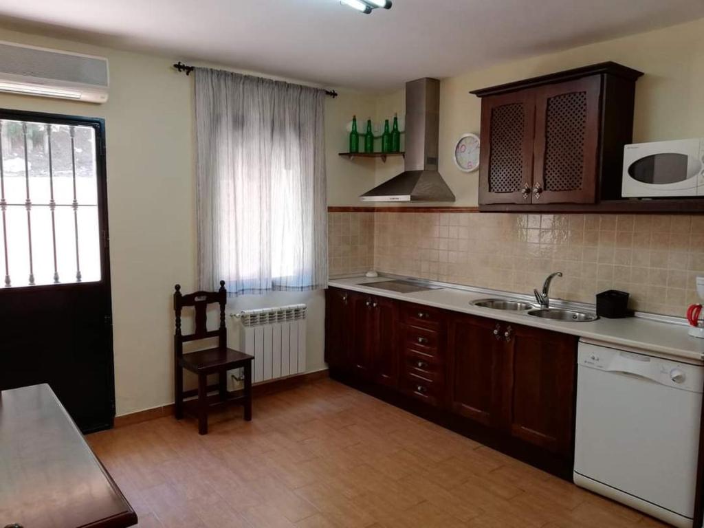 Kuchyň nebo kuchyňský kout v ubytování Complejo rural Mirador del Condado