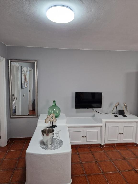TV a/nebo společenská místnost v ubytování MARODY HOUSE ATICO A