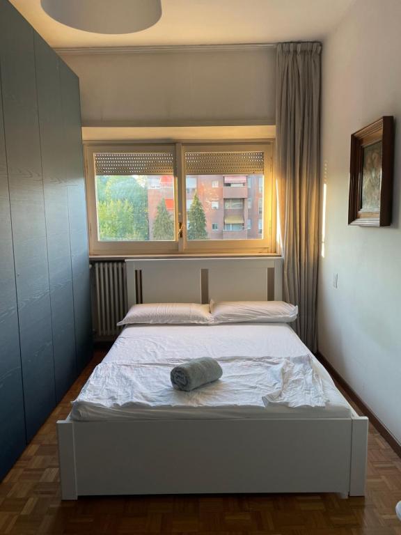 Łóżko lub łóżka w pokoju w obiekcie Lovely apartment in Gallarate