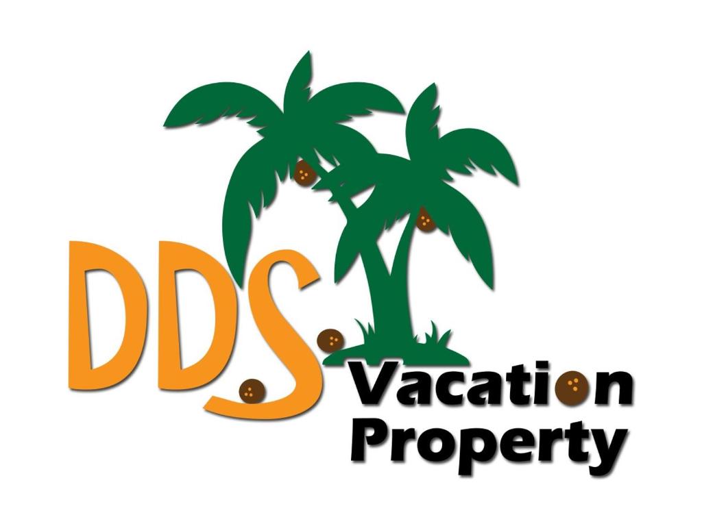 a logo for a dsp vacation program with a palm tree at DD'S Vacation Property in Harveys