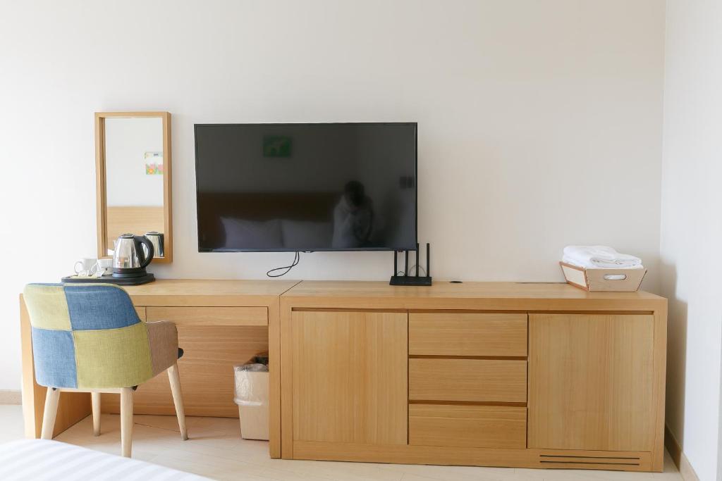 TV a/nebo společenská místnost v ubytování BK Hotel Jeju