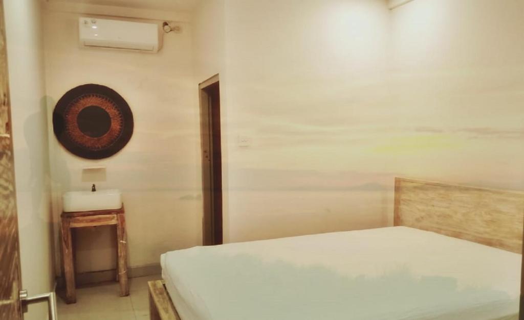 Postel nebo postele na pokoji v ubytování A-Manta Homestay