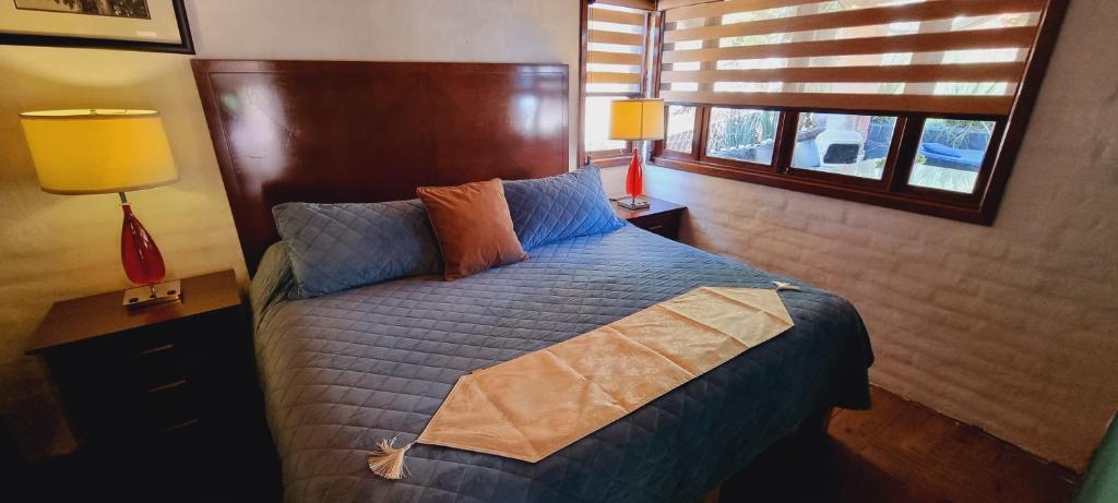 Postel nebo postele na pokoji v ubytování Villas de los Pinos 3