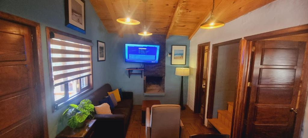 TV a/nebo společenská místnost v ubytování Villas de los Pinos 3