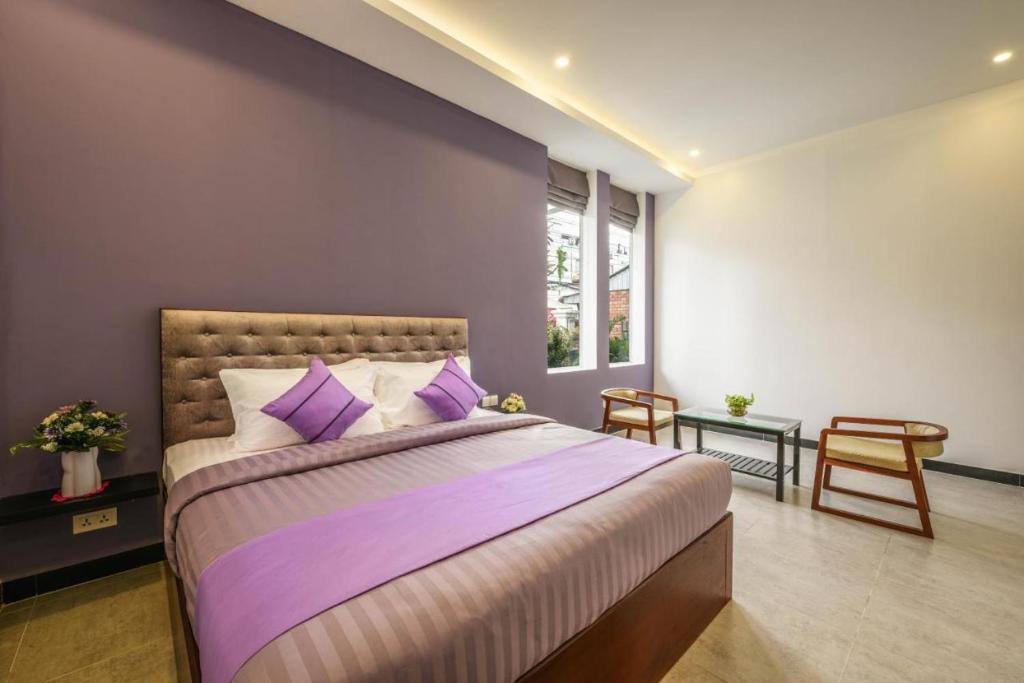 Postel nebo postele na pokoji v ubytování Hotel La Maravilla