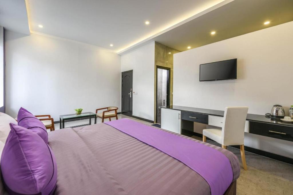 TV a/nebo společenská místnost v ubytování Hotel La Maravilla