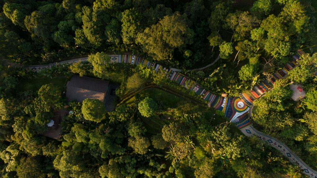 an overhead view of a road in the forest at P'apiu Resort in Ha Giang