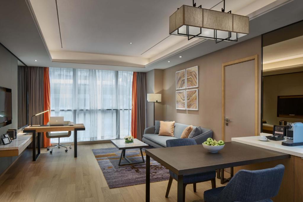 TV a/nebo společenská místnost v ubytování Primus Residence Shanghai Hongqiao
