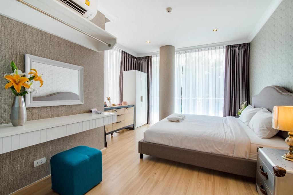Postel nebo postele na pokoji v ubytování Hua Hin My Resort 3BR Family Condo Free Water Park Walk to Beach & Cicada Night Market หัวหิน ห้องแฟมมิลี่ 3 ห้องนอน ฟรีสวนน้ำ ใกล้ทะเลและตลาดซิเคด้า