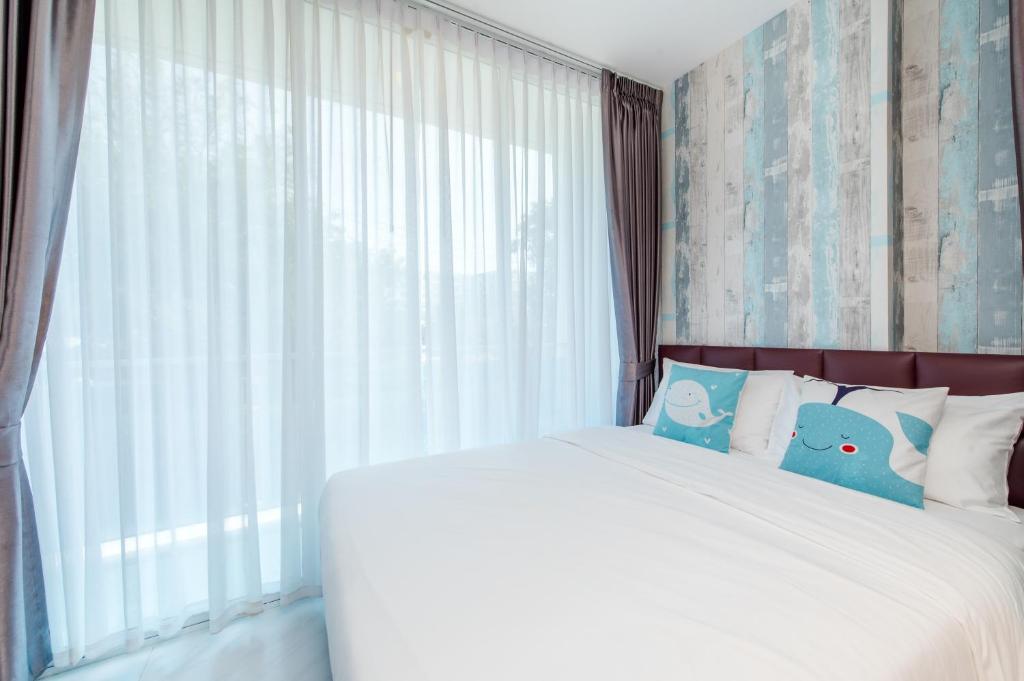 Postel nebo postele na pokoji v ubytování Hua Hin My Resort 3BR Family Condo Free Water Park Walk to Beach & Cicada Night Market หัวหิน ห้องแฟมมิลี่ 3 ห้องนอน ฟรีสวนน้ำ ใกล้ทะเลและตลาดซิเคด้า