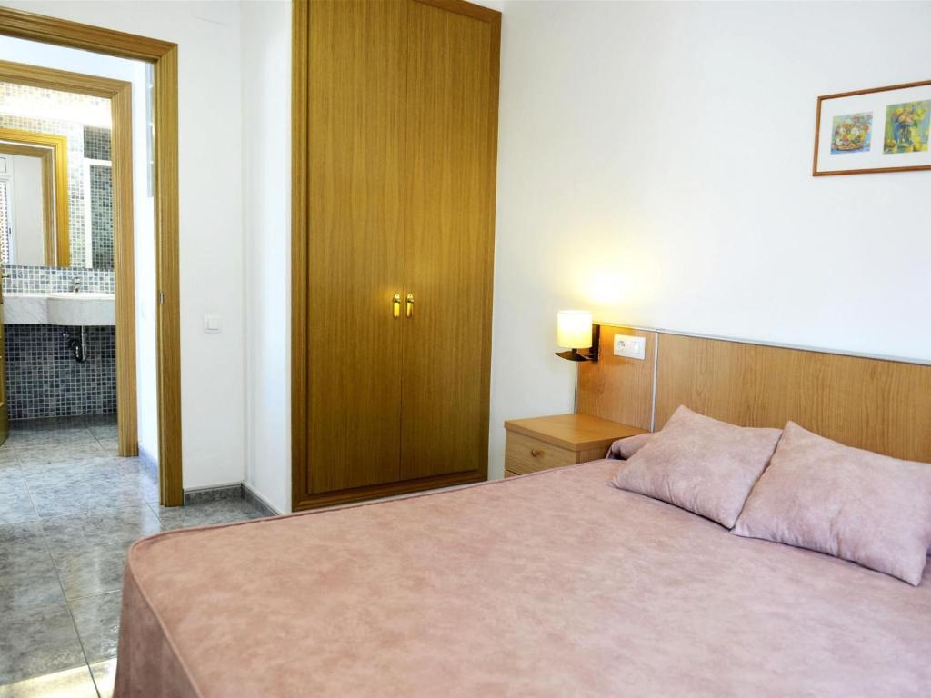 Postel nebo postele na pokoji v ubytování VINYA FARELLA 4 - Apartamento luminoso con vistas la mar y parking. - ES-228-19