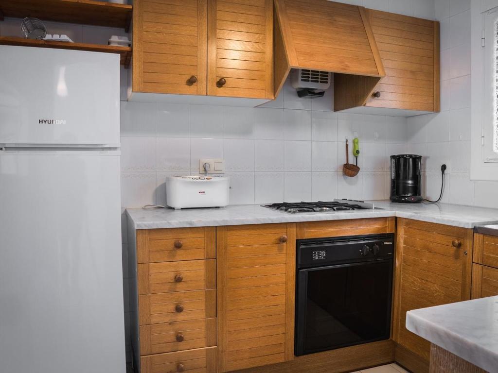 Kuchyňa alebo kuchynka v ubytovaní PARADÍS I - Apartamento con piscina en Llançà - ES-228-46