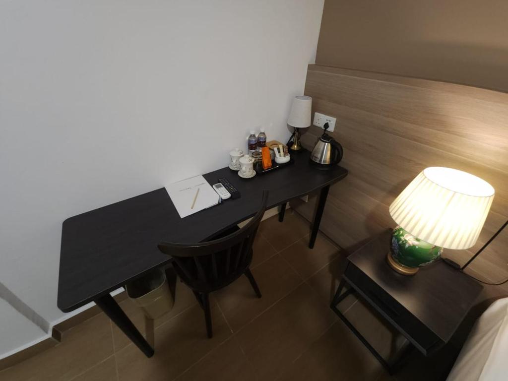 Postel nebo postele na pokoji v ubytování Yu Hotel Chinatown