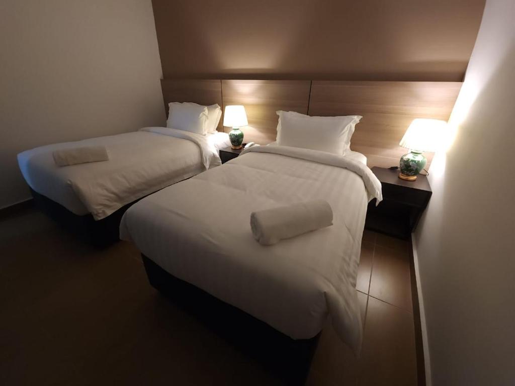 Postel nebo postele na pokoji v ubytování Yu Hotel Chinatown