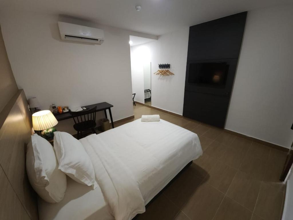 Postel nebo postele na pokoji v ubytování Yu Hotel Chinatown
