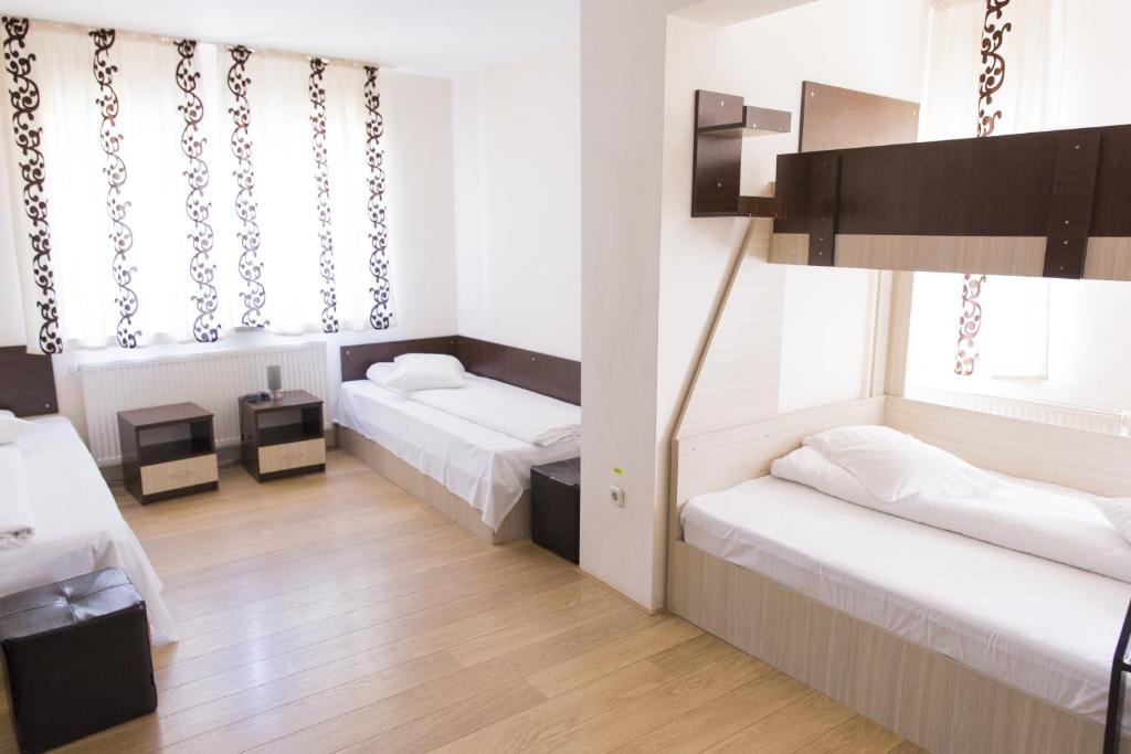 Postel nebo postele na pokoji v ubytování Hostel Holland Bacau