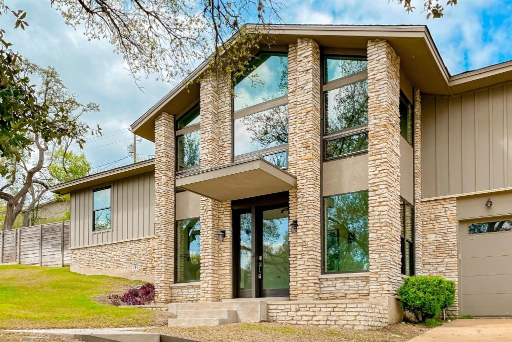 a house with large windows at Westbrook Wonder in Austin