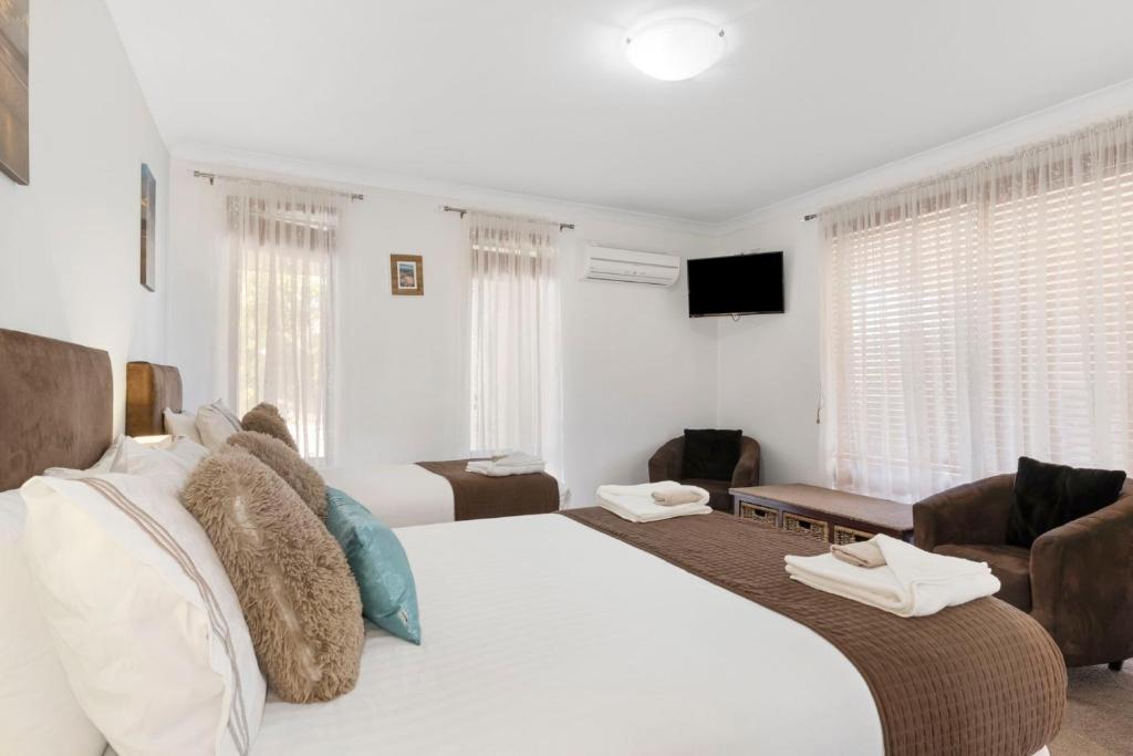 Postel nebo postele na pokoji v ubytování Baudins of Busselton Bed and Breakfast - Adults only
