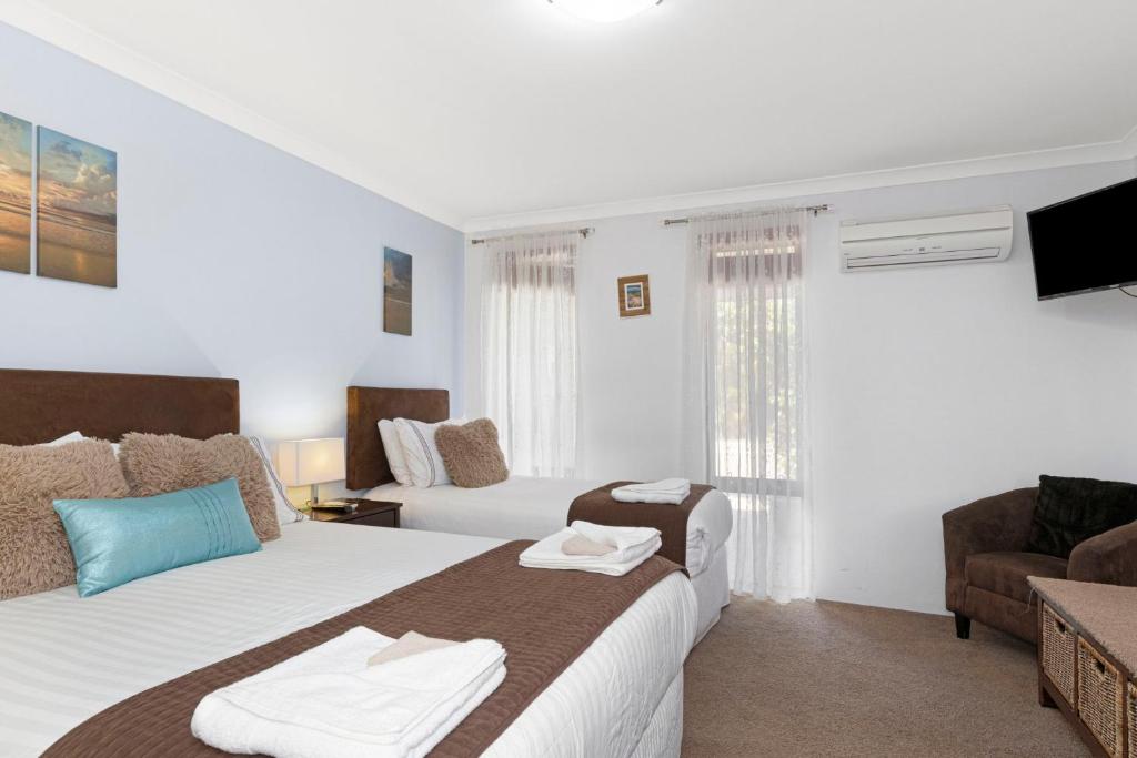Postel nebo postele na pokoji v ubytování Baudins of Busselton Bed and Breakfast - Adults only