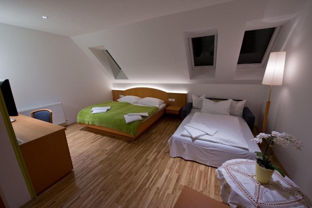 Postel nebo postele na pokoji v ubytování Hotel Restaurant Meyer