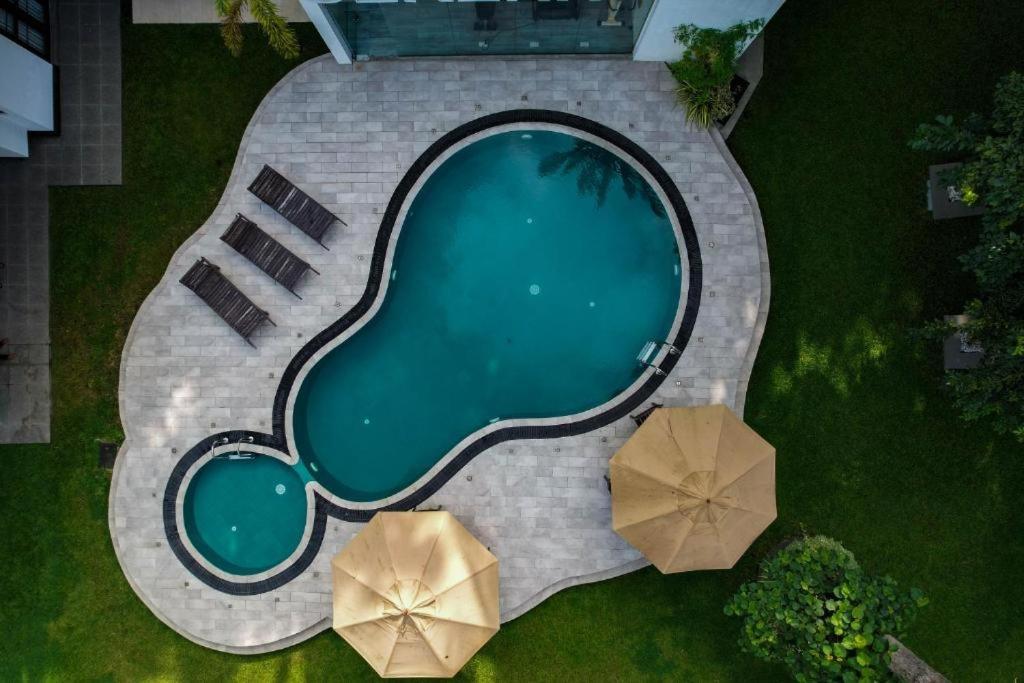 Bazén v ubytování Serenity Villa Dambulla nebo v jeho okolí