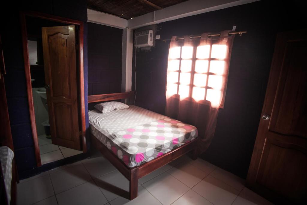 Postel nebo postele na pokoji v ubytování Hostel El Gran Azul Olon