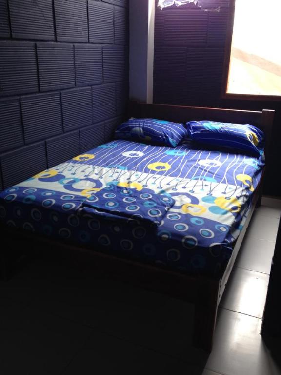 Postel nebo postele na pokoji v ubytování Hostel El Gran Azul Olon