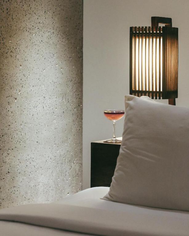 Giường trong phòng chung tại JM Boutique Hotel