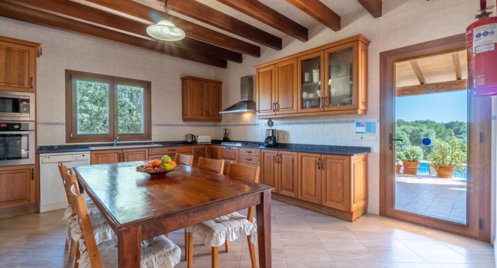 Kuchyň nebo kuchyňský kout v ubytování Villa Rito Nou