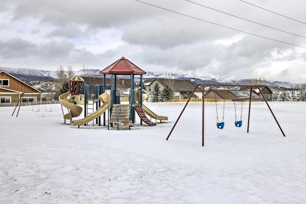 a playground in the snow with snow covered at Gypsum Home with Patio Between Glenwood and Vail in Eagle