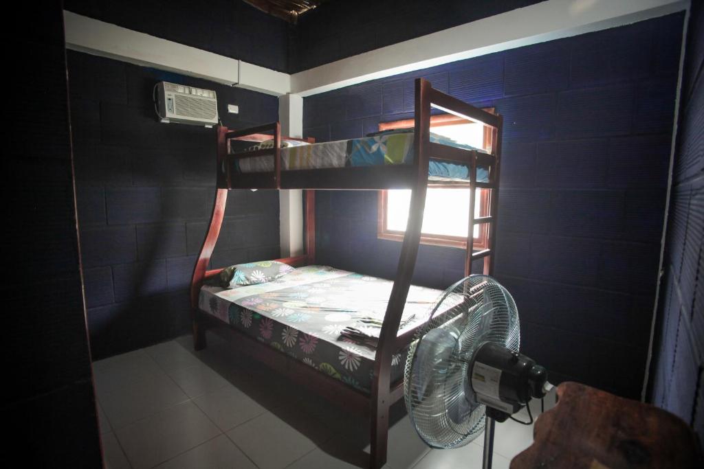 Postel nebo postele na pokoji v ubytování Hostel El Gran Azul Olon