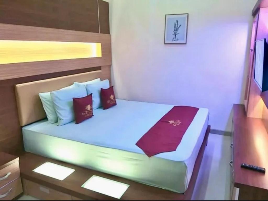 Postel nebo postele na pokoji v ubytování Prime House Muntilan