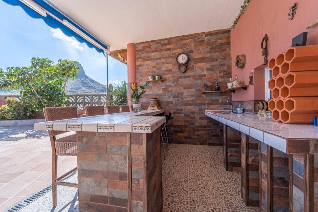 Kuchyň nebo kuchyňský kout v ubytování Villa Paulito El Roque