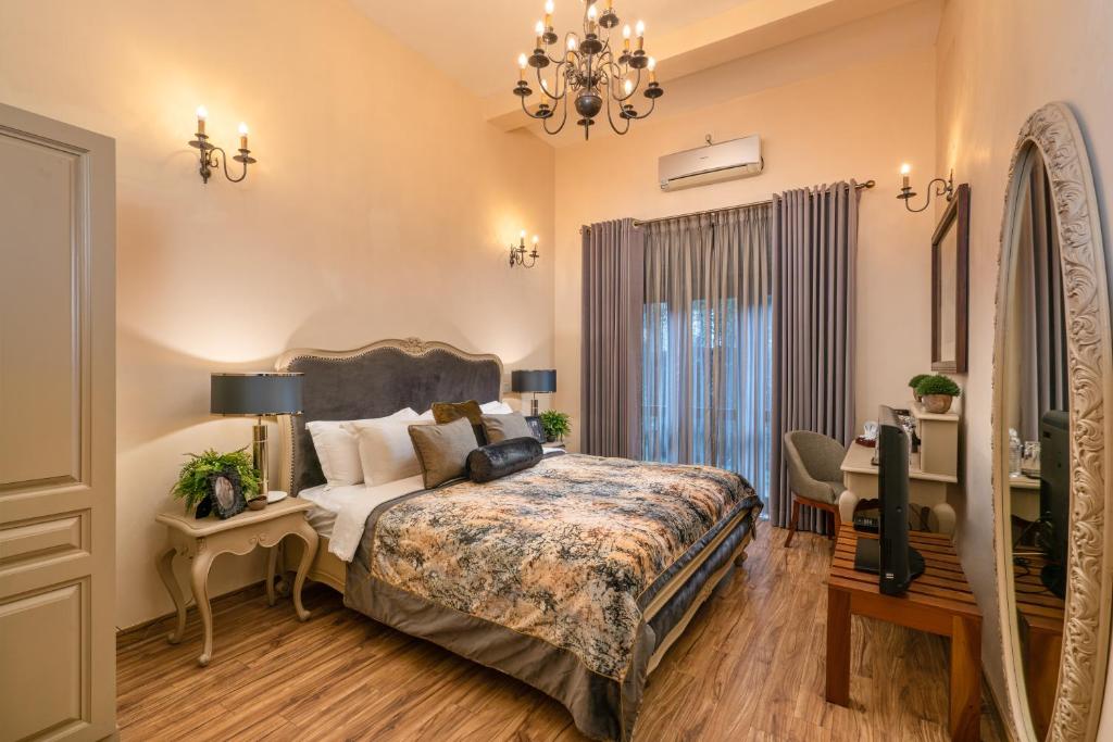 Postel nebo postele na pokoji v ubytování Clove Villa