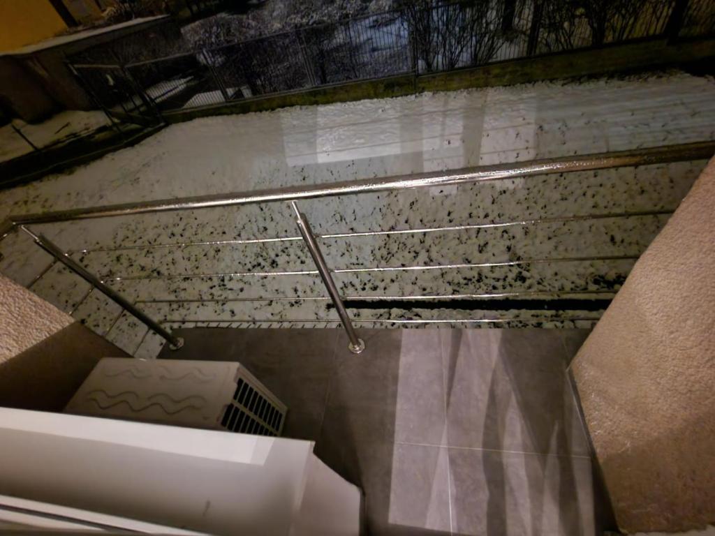 a view from the top of a bathroom with stairs at Luxury Aparments Klimatyzacja z Prywatnym Parkingiem in Radom