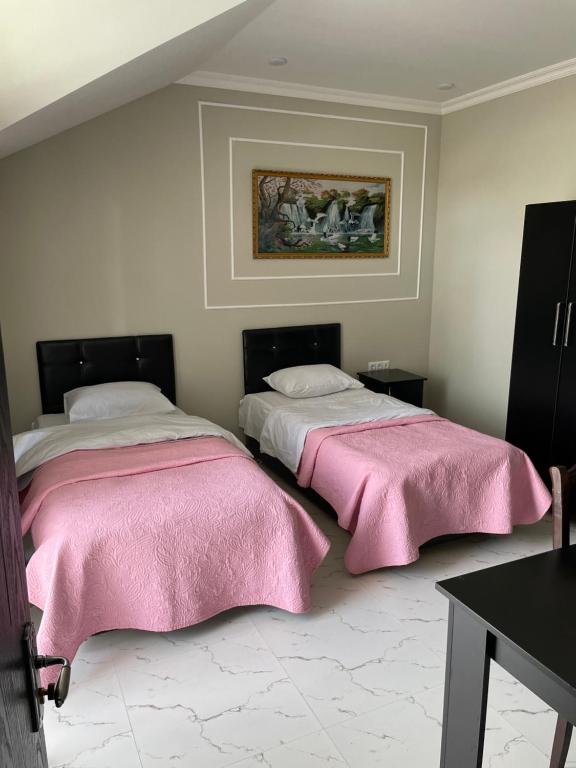Postel nebo postele na pokoji v ubytování Four Seasons Hotel