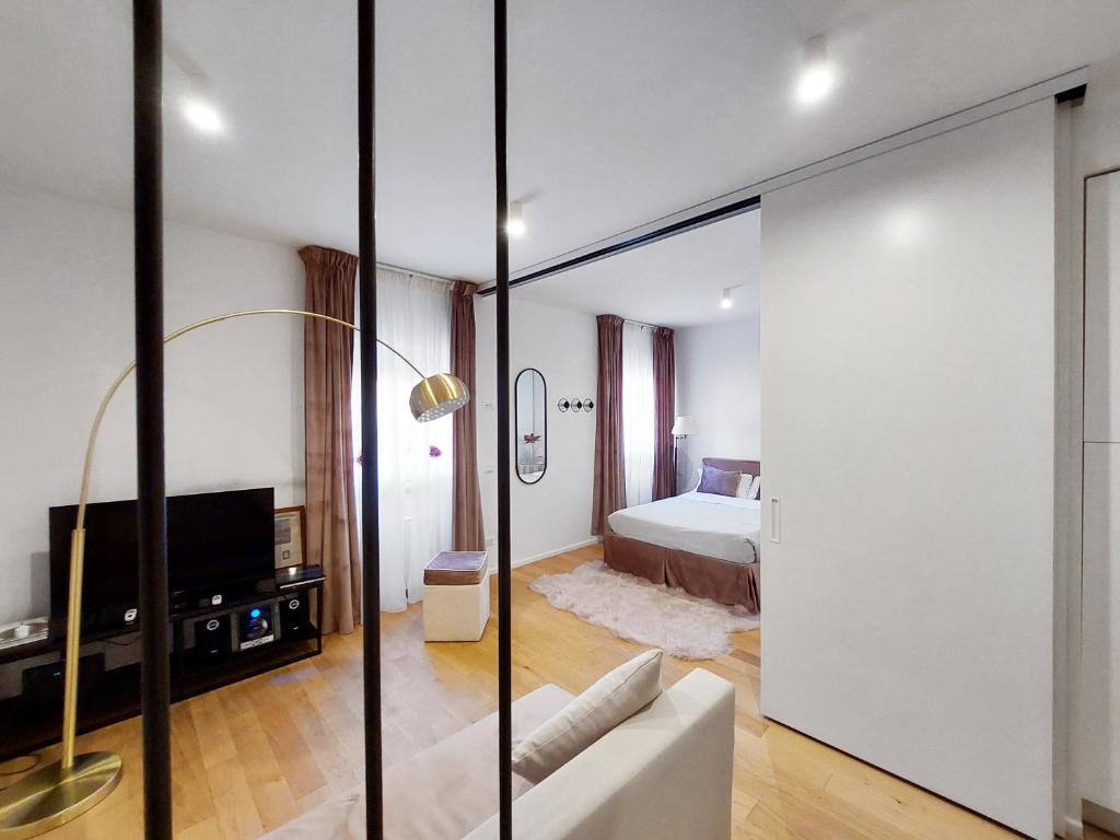 Posteľ alebo postele v izbe v ubytovaní Piazza di Spagna - Suite Donata, strollingrome