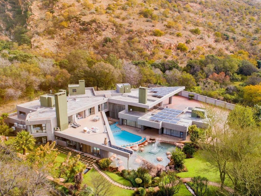 an aerial view of a house with a swimming pool at Bophirima Boutique Hotel in Rustenburg