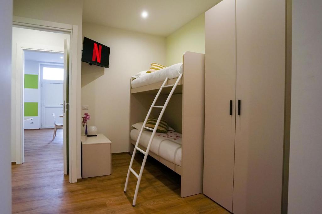 Postel nebo postele na pokoji v ubytování [Camelia Suite] Leonardo Academy, MXP & Lakes