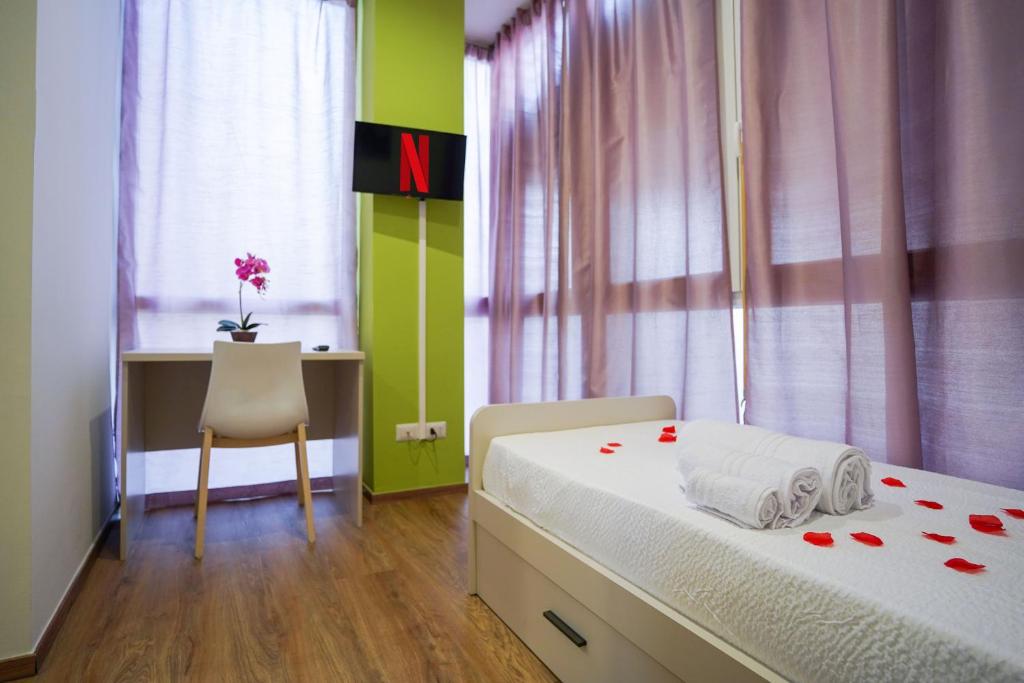 Postel nebo postele na pokoji v ubytování [Camelia Suite] Leonardo Academy, MXP & Lakes