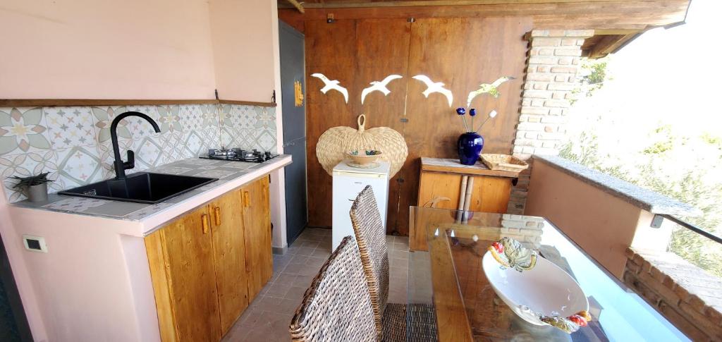 Kuchyň nebo kuchyňský kout v ubytování APP Spiaggia Bianca