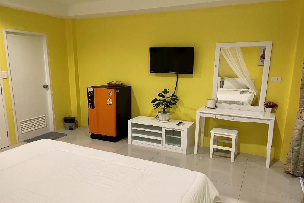 TV a/nebo společenská místnost v ubytování Be Rich Hotel