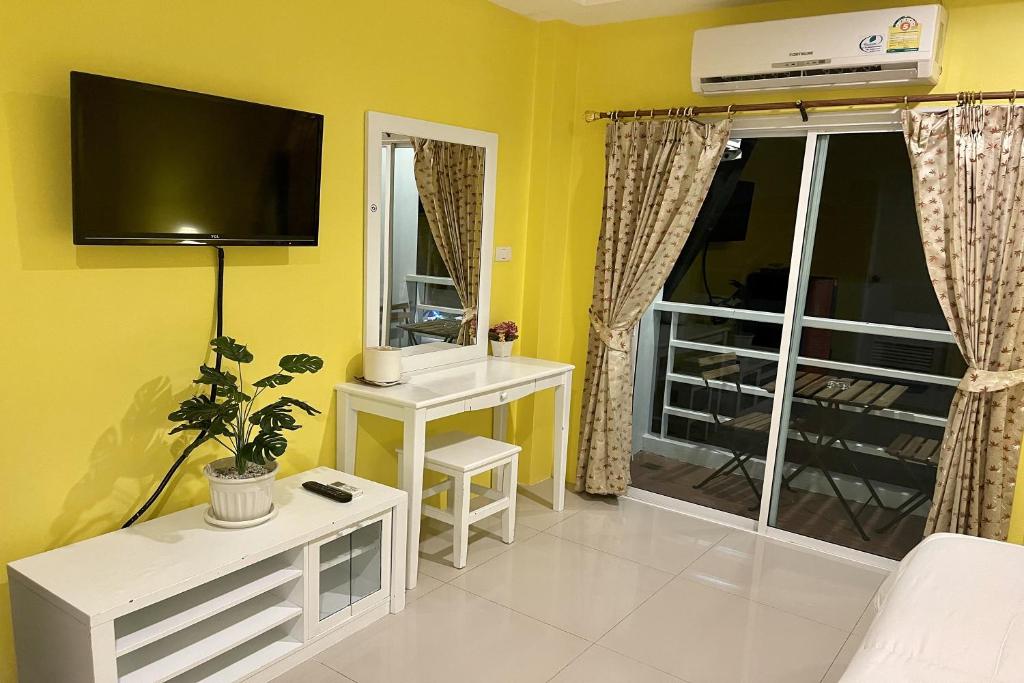 TV a/nebo společenská místnost v ubytování Be Rich Hotel