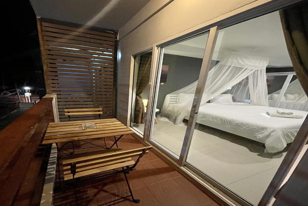 Postel nebo postele na pokoji v ubytování Be Rich Hotel