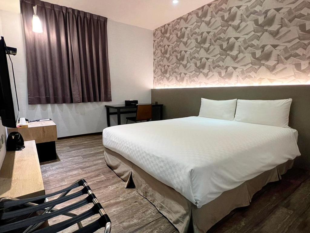 &#x7DBA;&#x6A02;&#x6587;&#x65C5; &#x6843;&#x5712;&#x9928; Le Room Hotel Taoyuan&#x623F;&#x9593;&#x7684;&#x5E8A;