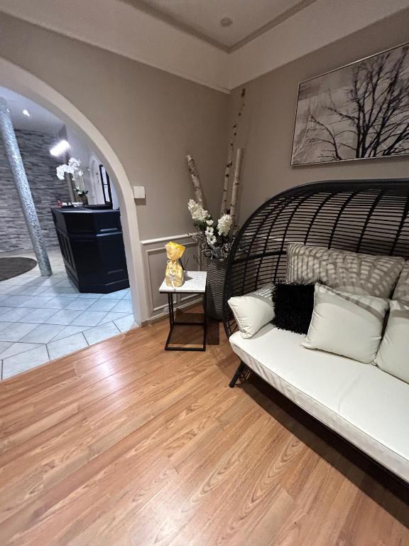 Posezení v ubytování Hotel Le Divona "au coeur de Divonne"