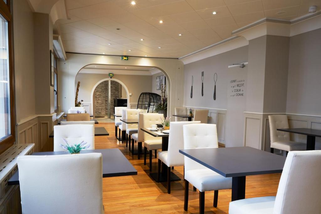Posezení v ubytování Hotel Le Divona "au coeur de Divonne"