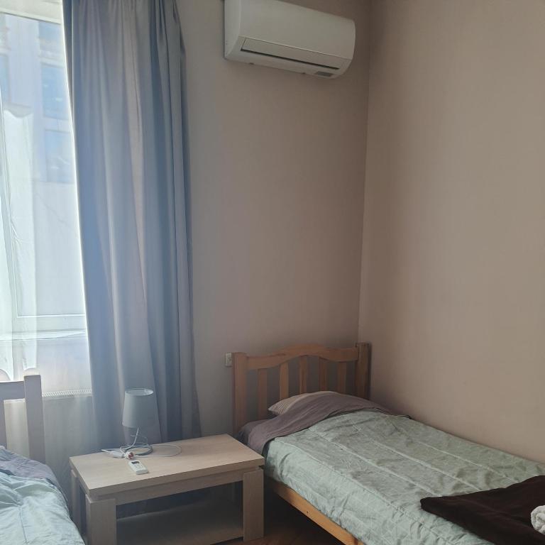 Postel nebo postele na pokoji v ubytování Guesthouse Hillside
