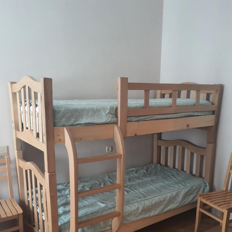 Postel nebo postele na pokoji v ubytování Guesthouse Hillside