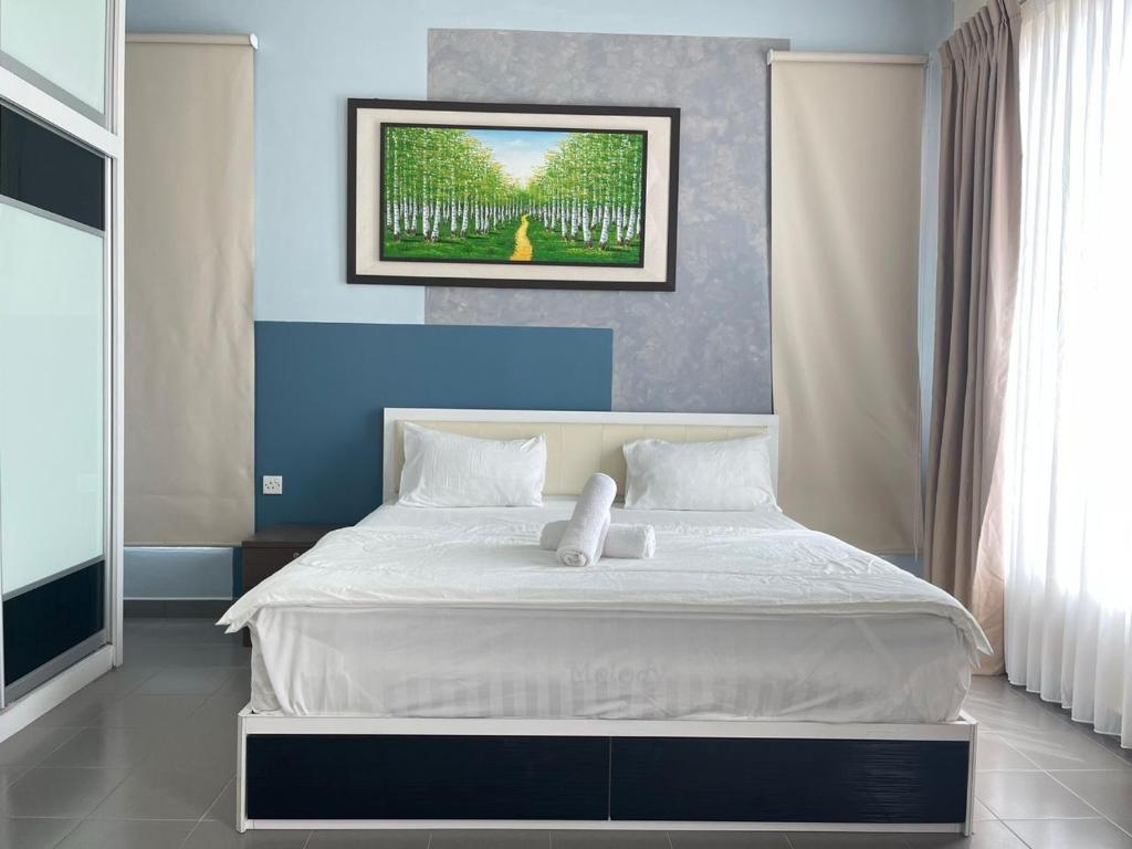 Postel nebo postele na pokoji v ubytování MR Homestay HotelStyle Room Teluk Intan